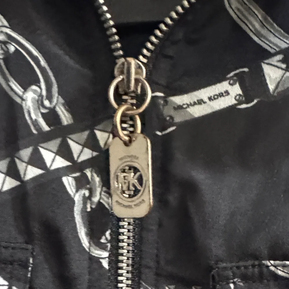 Michael Kors Black Zip-Front Jacket with Silver Chain Print